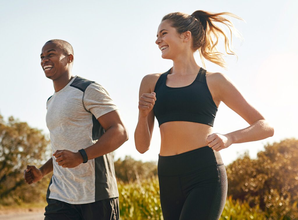 couple running on road