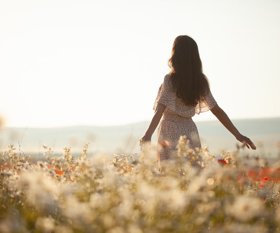 women walking and touching flowers mobile
