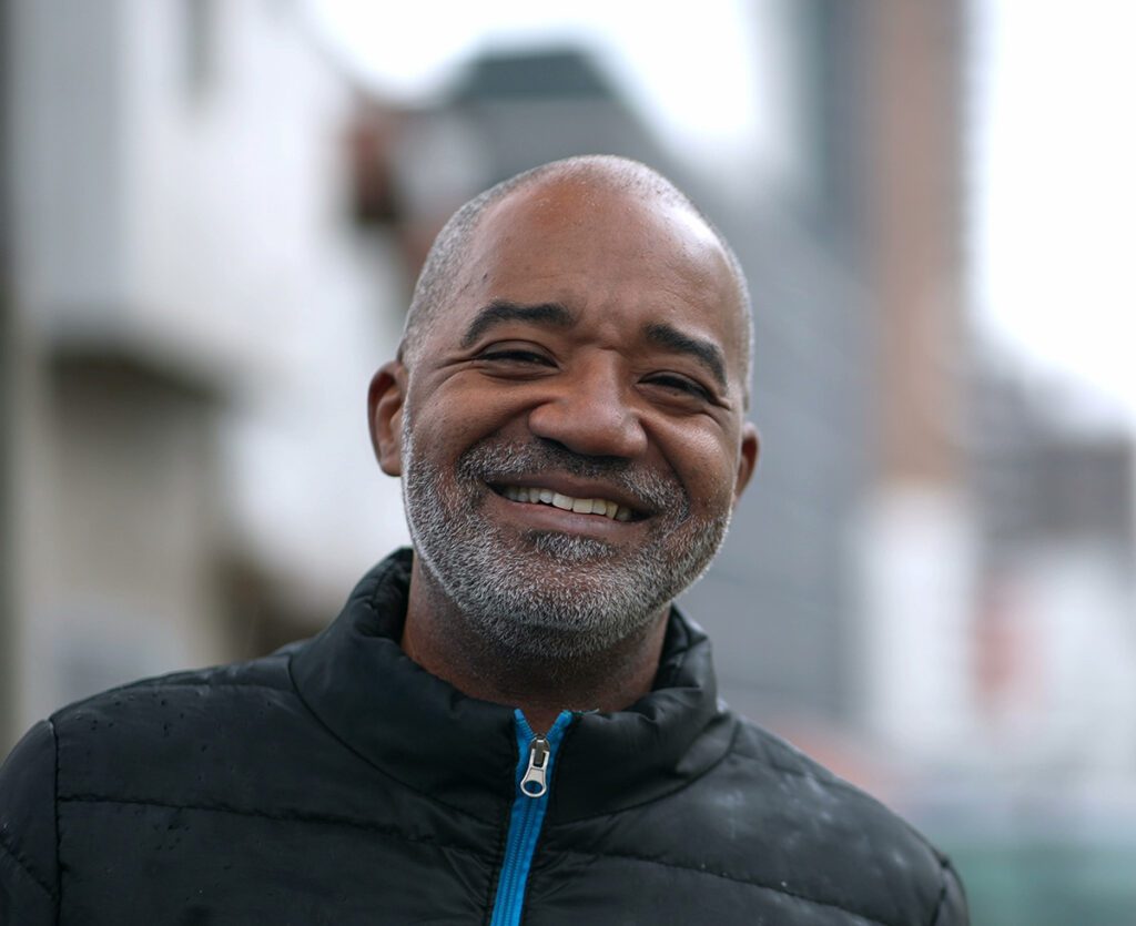 A happy senior black man portrait face smiling