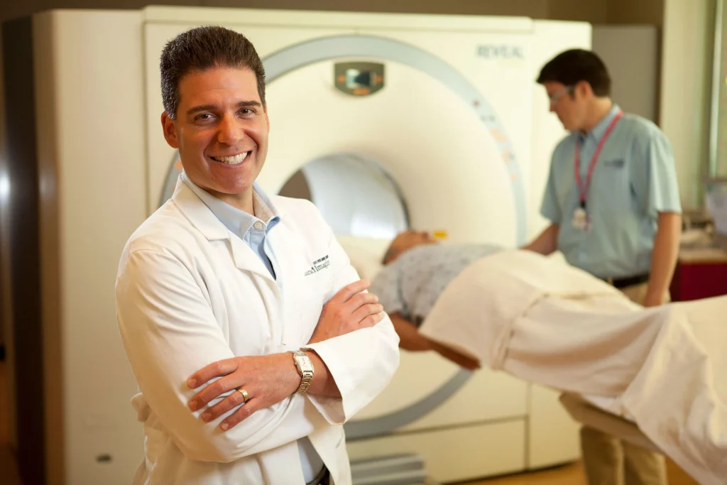 inland imaging doctor with patient in back getting procedure