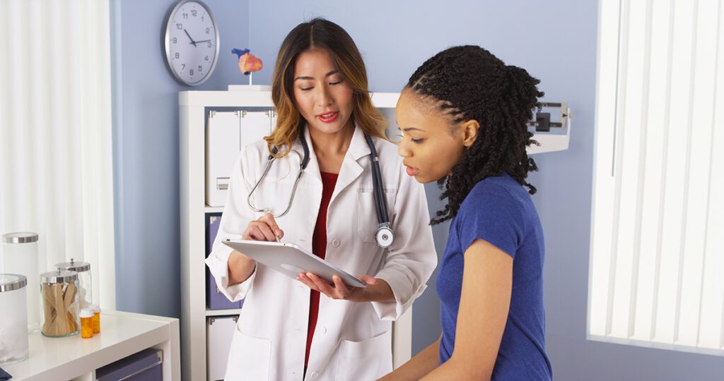 patient with doctor at appointment