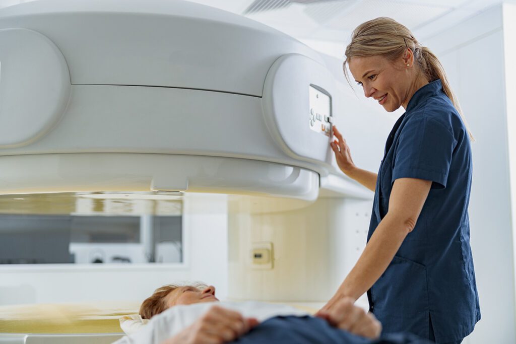 radiologist with patient undergoing prcedure