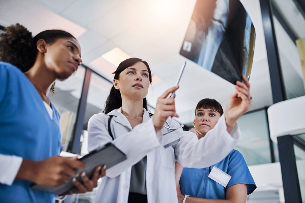 radiologists working together looking at x ray